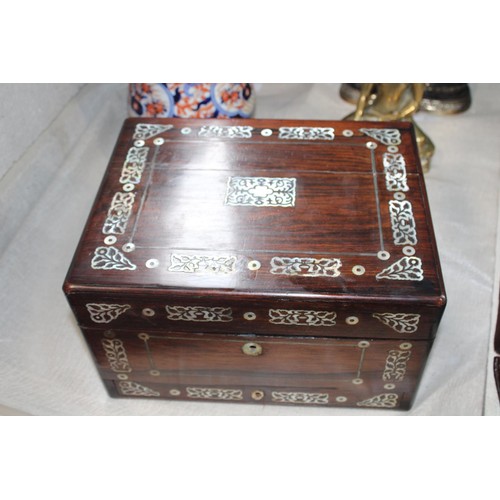 1 - An oriental rose wood vanity box with MOP inlay and brass handles. Contents complete (slight damage ... 