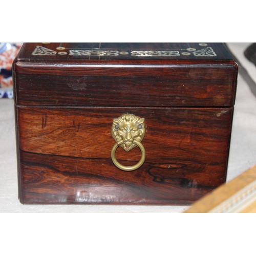 1 - An oriental rose wood vanity box with MOP inlay and brass handles. Contents complete (slight damage ... 