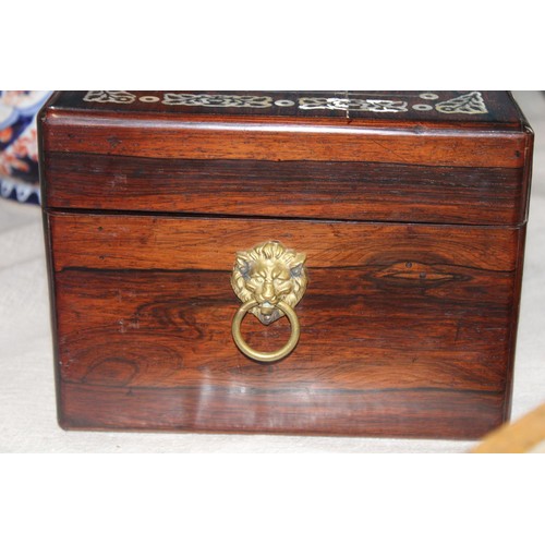 1 - An oriental rose wood vanity box with MOP inlay and brass handles. Contents complete (slight damage ... 