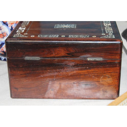 1 - An oriental rose wood vanity box with MOP inlay and brass handles. Contents complete (slight damage ... 