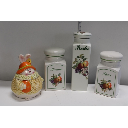 60 - Four ceramic lidded storage jars