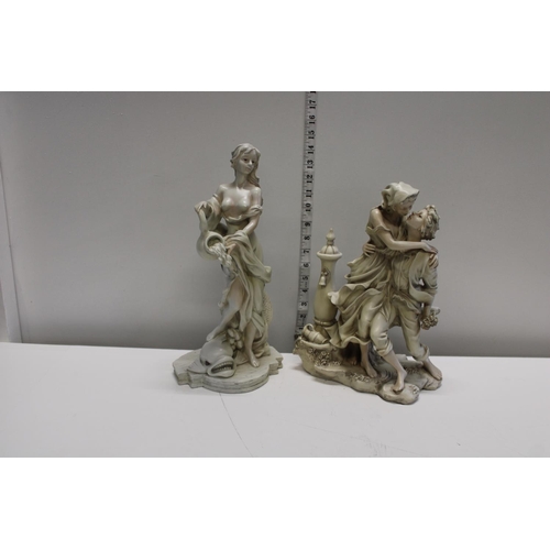 9 - A pair of classical themed figures