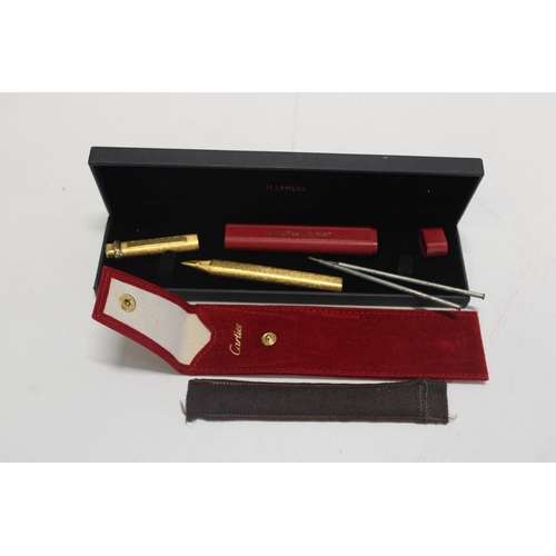 12 - A Cartier Vendome Trinity Pen with refills in Cartier pouch.