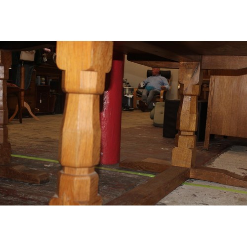 97 - A large vintage Derek 'Lizardman' Slater oak table with carved lizard to one leg. (Derek was an appr... 