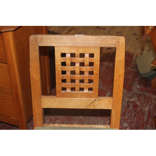 98 - Four vintage Derek 'Lizardman' Slater oak dining chairs with lattice work backs. All with a carved l... 