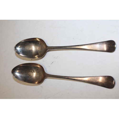 162 - A pair of Georgian hallmarked silver spoons (145 grams)