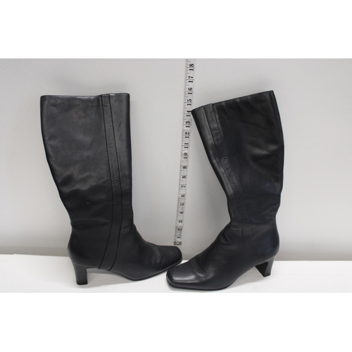 191 - A pair of as new Ladies black  leather zip up boots size 6