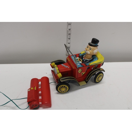 235 - A vintage Willy The Walking Car tin plate model (un-tested)