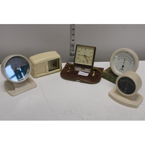 30 - A selection of vintage table top clocks and thermometers