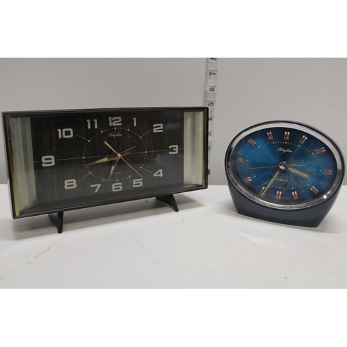 318 - Two vintage Rhythm clocks