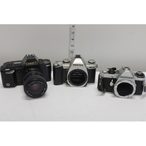 37 - Two Pentax camera bodies & a Canon T70 camera