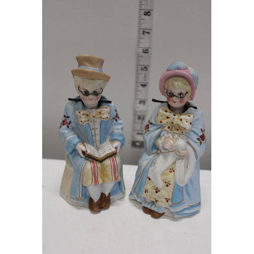 52 - A pair of 19th century pottery nodding figurines. (one with slight damage)