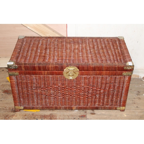 87 - A wicker work & brass mounted storage chest. Postage unavailable. 81cm long