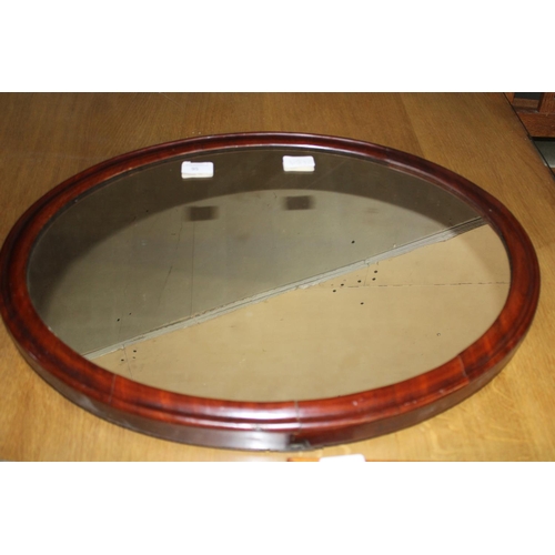 95 - A antique oval framed mirror. Length 59cm Postage unavailable