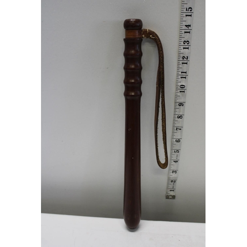 26 - A vintage wooden truncheon