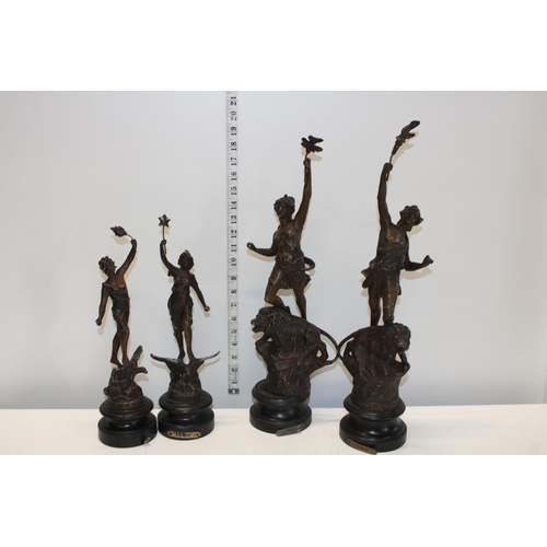 423 - Two pairs of vintage spelter figurines