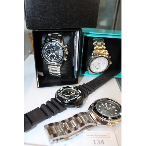 134 - Four assorted men's watches