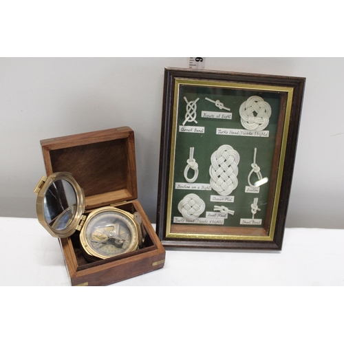 299 - A boxed brass compass and framed not display (compass needs attention)