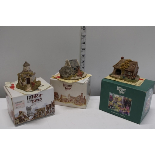 304 - Three boxed Lilliput Lane model houses