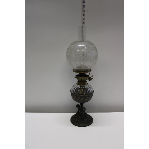 41 - An antique glass and brass oil lamp with a Hinks duplex burner