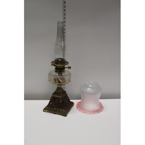 42 - An antique brass and glass oil lamp with a Hinks burner