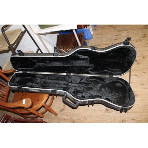 78 - A hard plastic guitar case. Collection only