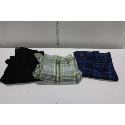 437 - Three pairs of golfing trousers