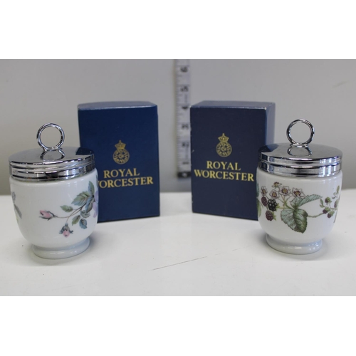 156 - Two boxed Royal Worcester egg coddlers