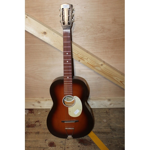 76 - A six string acoustic guitar. Postage unavailable