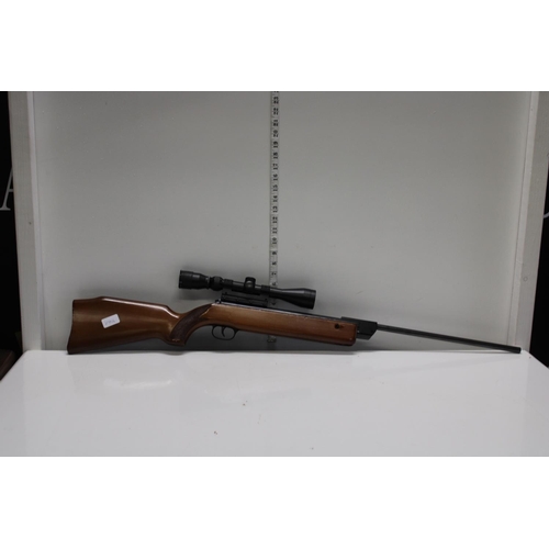 106 - A vintage Diana .22 air rifle with scope. postage unavailable