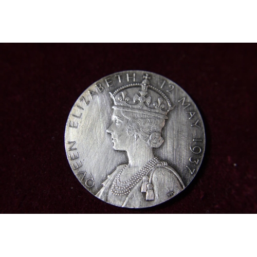 111 - A 1937 silver Coronation medal