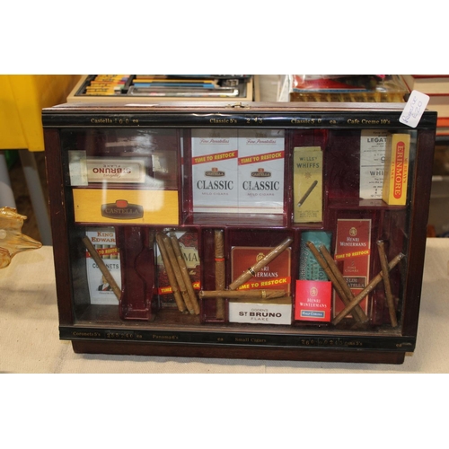 34 - A vintage Cigar display case with contents