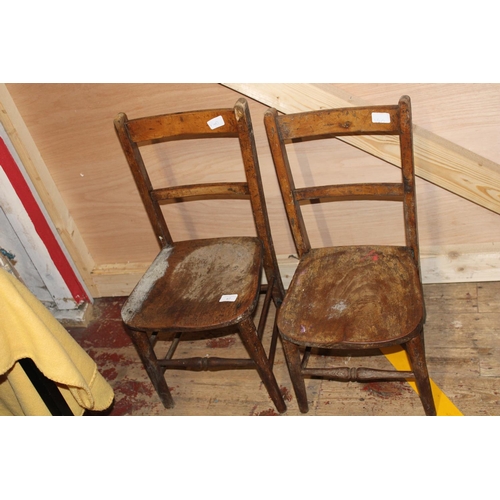 67 - A pair of antique wooden children's chairs. Postage unavailable