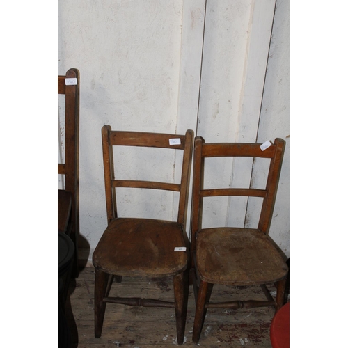 69 - A small pair of child's wooden chairs Postage unavailable