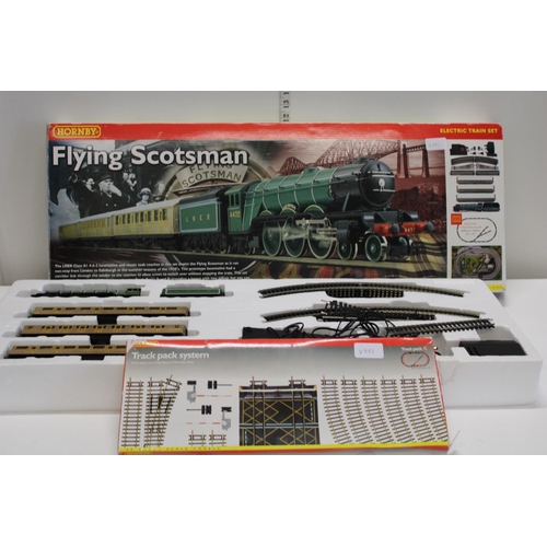 7 - A boxed Hornby Flying Scotsman Electric train set with a Hornby track pack system (complete)