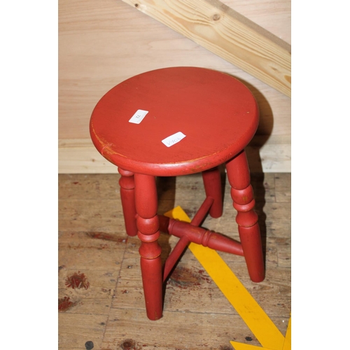 72 - A vintage red painted wooden stool. postage unavailable