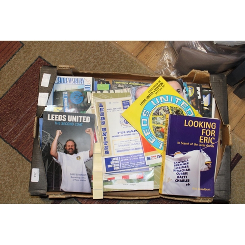 264 - A selection of vintage Leeds United football programmes and books