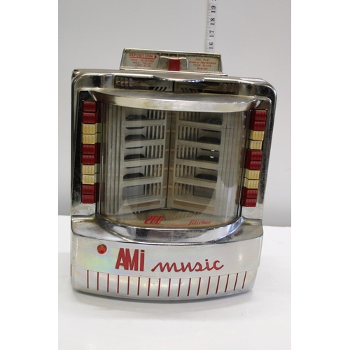 300 - A 1950's AMI Music wall mounted Dukebox. Collection only