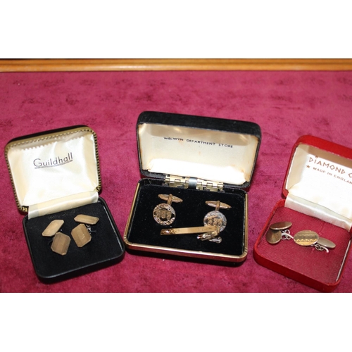 413 - Three pairs of 925 silver gilt cufflinks and tie pin