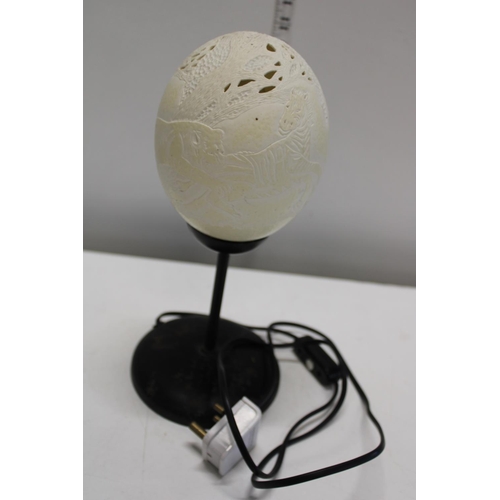 61 - A vintage table lamp made from a carved Ostrich egg