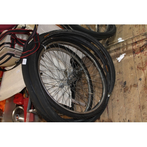 113 - A selection of cycle tyres and wheels, postage unavailable