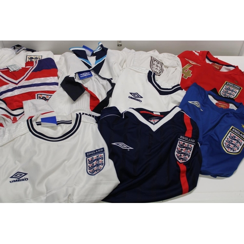 246 - A job lot of assorted England football shirts