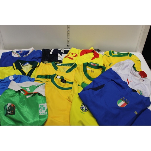 247 - A job lot of assorted international football shirts