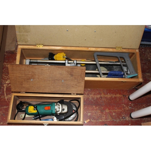 297 - A manual tile cutter and electric angle grinder, postage unavailable