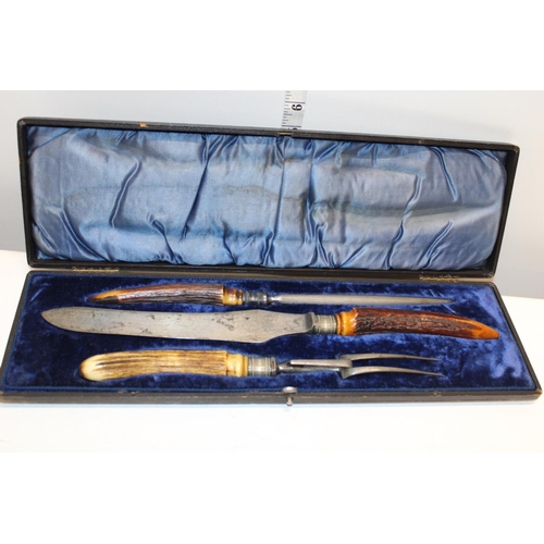 310 - A vintage cased carving set