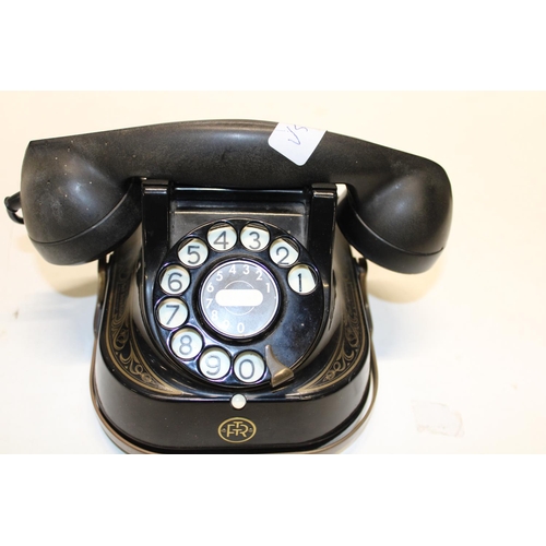 317 - A vintage telephone