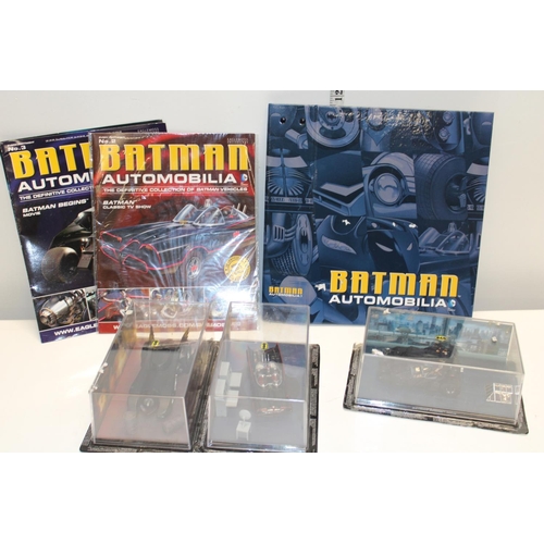 267 - Three boxed Batman car models and booklets