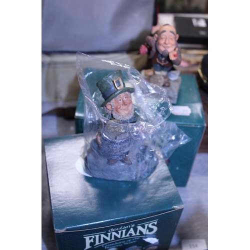 114 - Two Declan's Finnians Blarney Stone figure