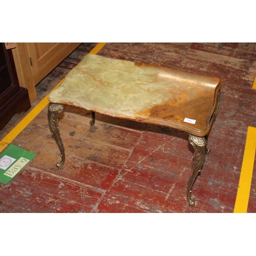 300 - A vintage Onyx topped coffee table. collection only