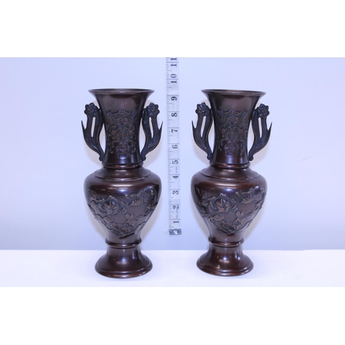 323 - A pair of Meijo period Japanese bronze vases